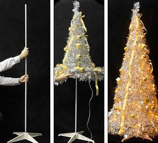 Illustration for article titled Instant Xmas Tree-In-a-Pizza-Box Is Probably Made by ACME
